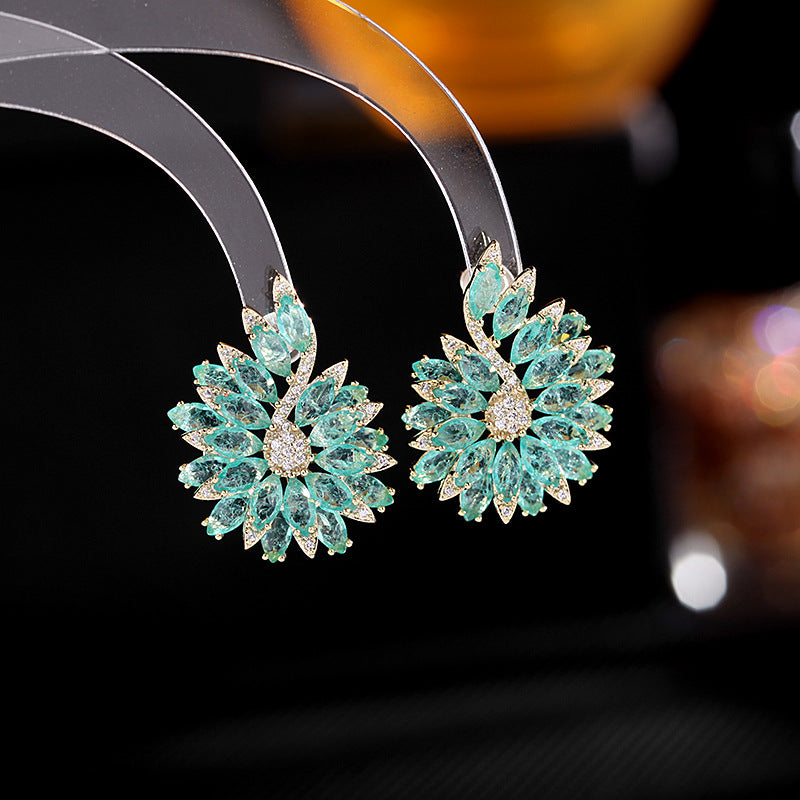 Blue zircon inlaid small fresh earrings S925 silver needle flower earrings