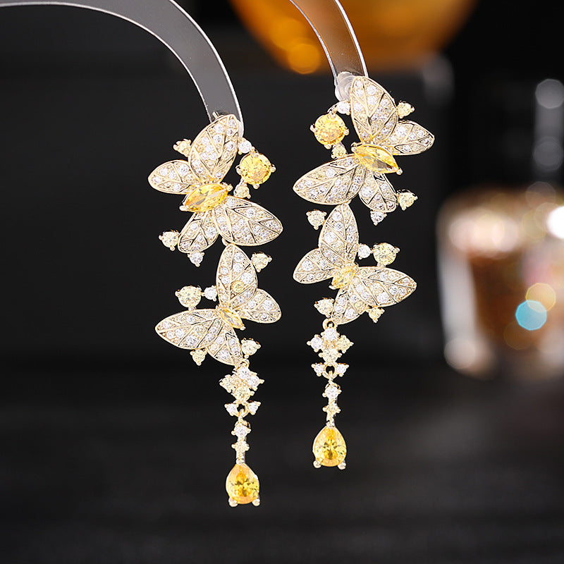 Atmospheric water drop earrings, creative design, dancing butterfly earrings