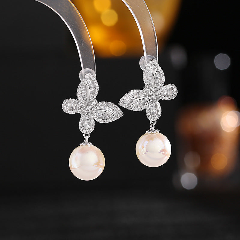 fashionable commuter earrings butterfly pearl earrings