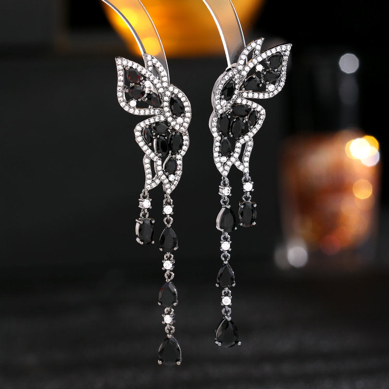 long face-modifying butterfly water drop tassel earrings