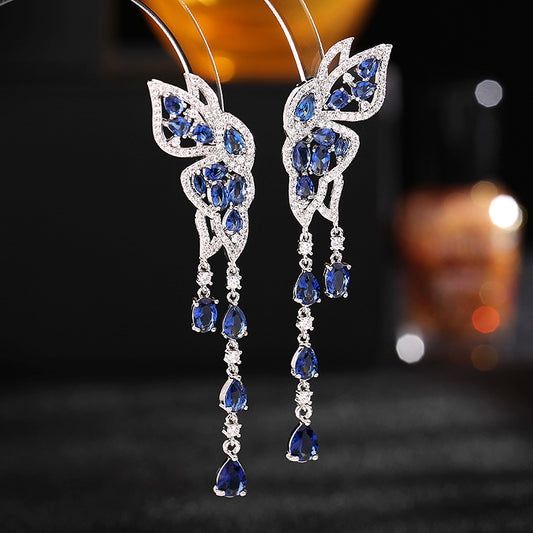 long face-modifying butterfly water drop tassel earrings